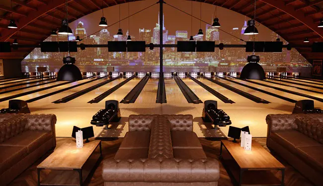 New York City by night bowling alley Bowling alley with visuals of New York City by night
